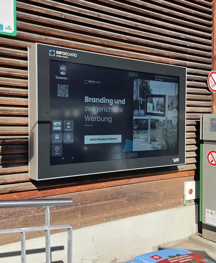 Infoboard Schweiz AG: 75-inch outdoor screen at Gstaad station project by IMAGEMEDIA